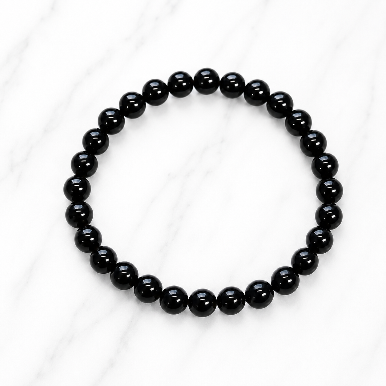 Pulseira de Turmalina Negra Natural 6 mm – Proteção e Equilíbrio